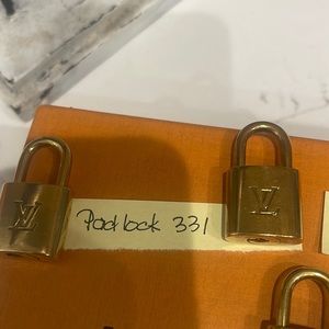 Authentic LV padlock 🔒 331 gold Louis Vuitton (padlock 🔒 with out the key 🔑